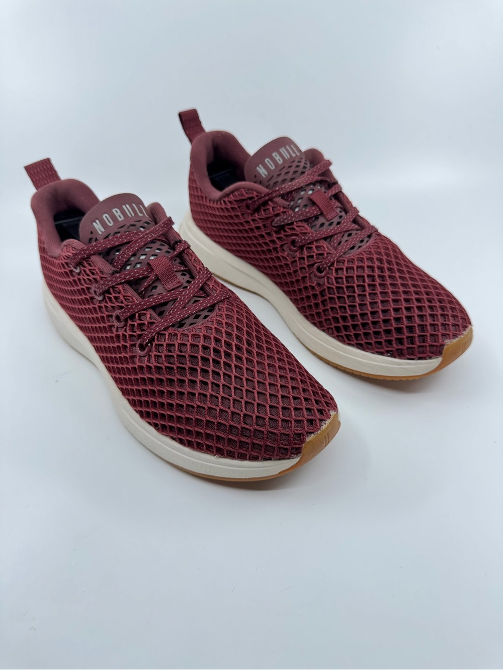 NOBULL Runners feature a breathable maroon mesh upper and a gum rubber SZ 8.5